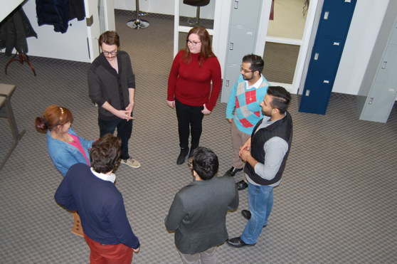 Morning stand-up meeting in the ALIF Bullpen.